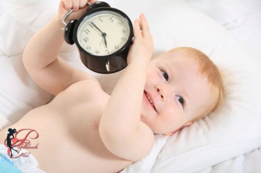 child with an alarm clock